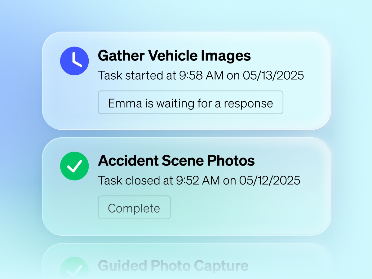 Task status cards for vehicle and accident photo capture, one in progress and one completed